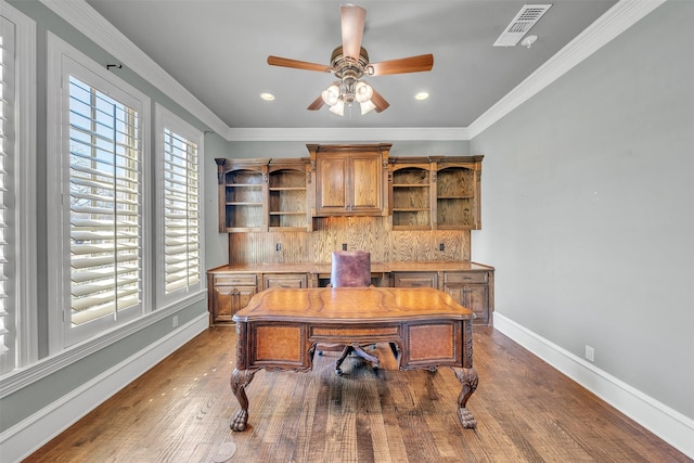 2909 Canyon Creek Dr, Sherman, TX 75092 - home office featuring a ceiling fan, wood finished floors, ornamental molding, and recessed lighting