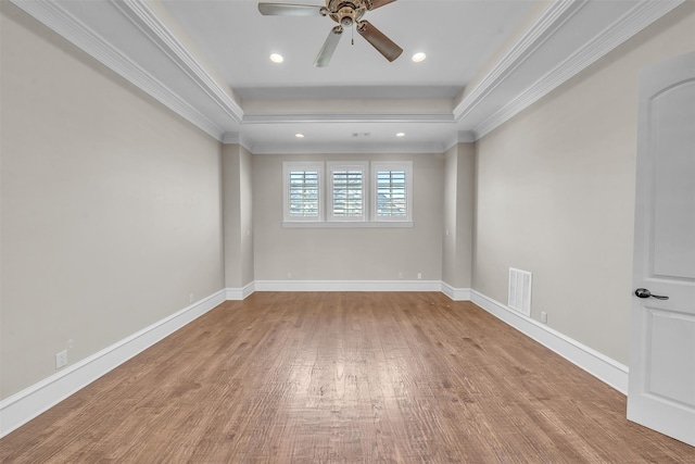 2909 Canyon Creek Dr, Sherman, TX 75092 - spare room with a ceiling fan, wood finished floors, a raised ceiling, crown molding, and recessed lighting