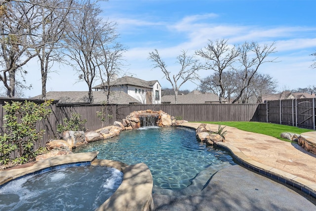 2909 Canyon Creek Dr, Sherman, TX 75092 - view of swimming pool featuring a fenced backyard, a pool with connected hot tub, and a patio