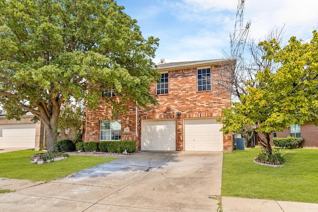 view of front of home featuring brick siding, concrete driveway, a front yard, cooling unit, and an attached garage