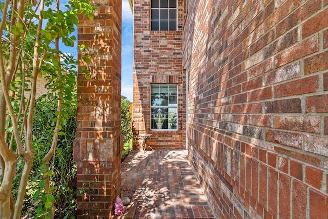 entrance to property with brick siding