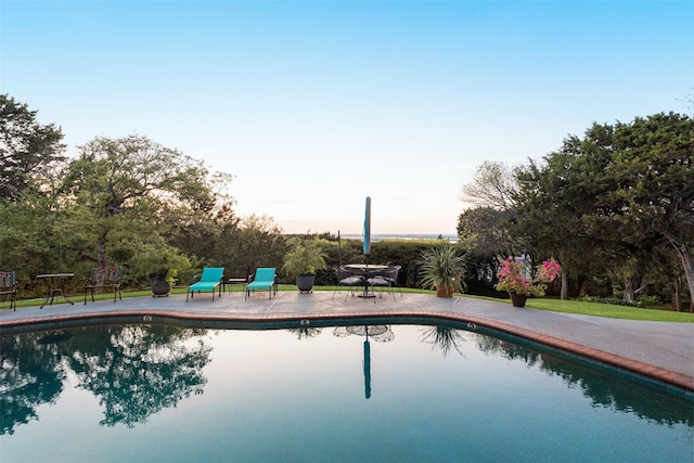 outdoor pool featuring a patio area
