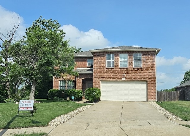 1416 Connie St, Burleson, TX 76028 - traditional home with an attached garage, brick siding, driveway, and a front lawn