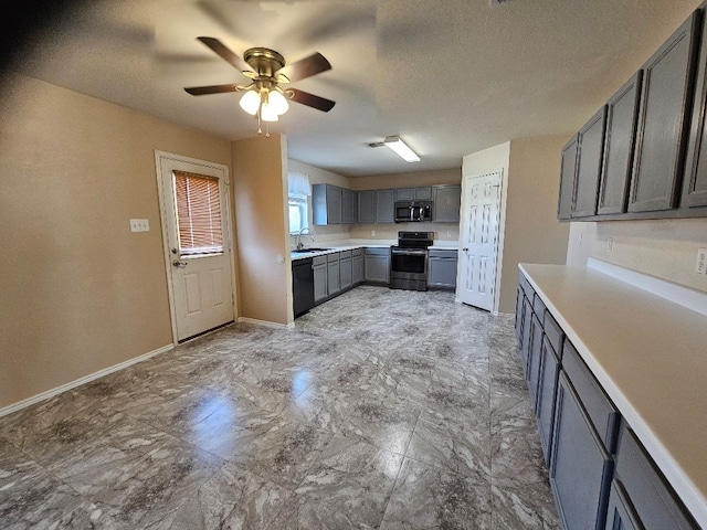 1416 Connie St, Burleson, TX 76028 - kitchen with a sink, baseboards, ceiling fan, light countertops, and appliances with stainless steel finishes