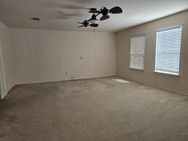 1416 Connie St, Burleson, TX 76028 - carpeted spare room featuring ceiling fan, baseboards, and visible vents