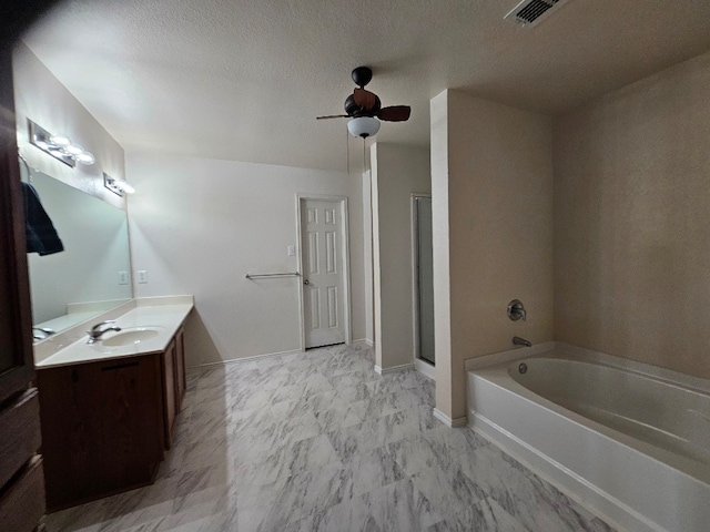 1416 Connie St, Burleson, TX 76028 - full bathroom featuring vanity, visible vents, ceiling fan, a shower stall, and a garden tub
