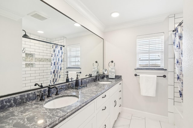full bathroom with baseboards, visible vents, ornamental molding, and a sink