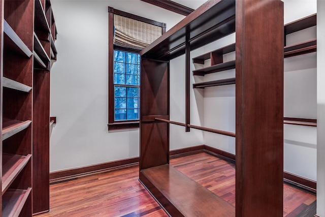 spacious closet with wood finished floors