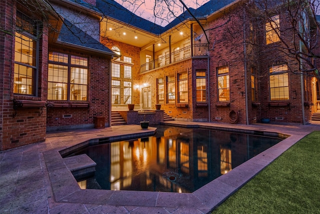 pool with a patio