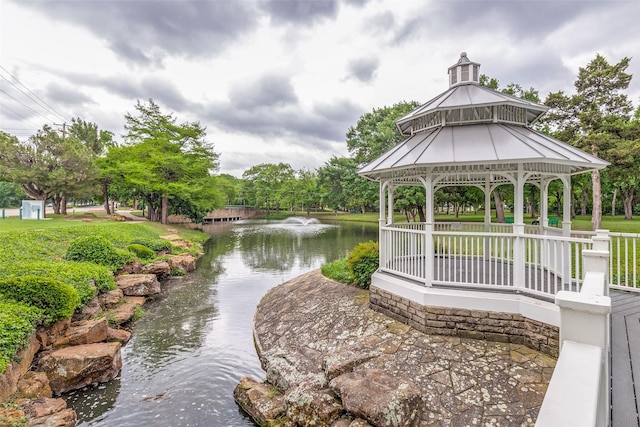 view of home's community featuring a gazebo and a water view