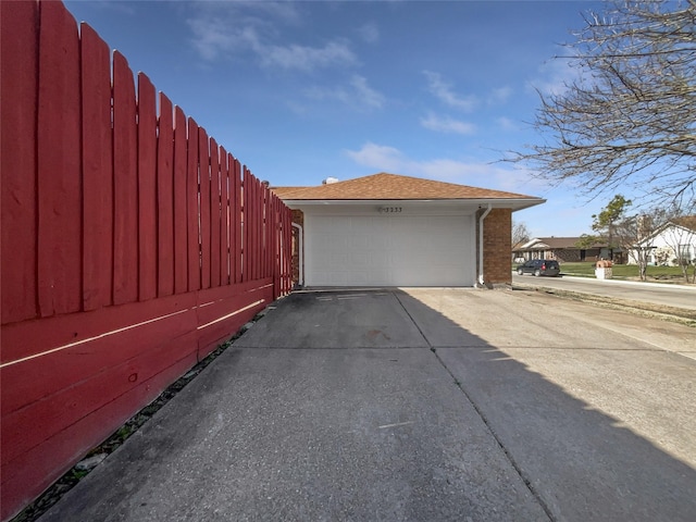 detached garage with fence