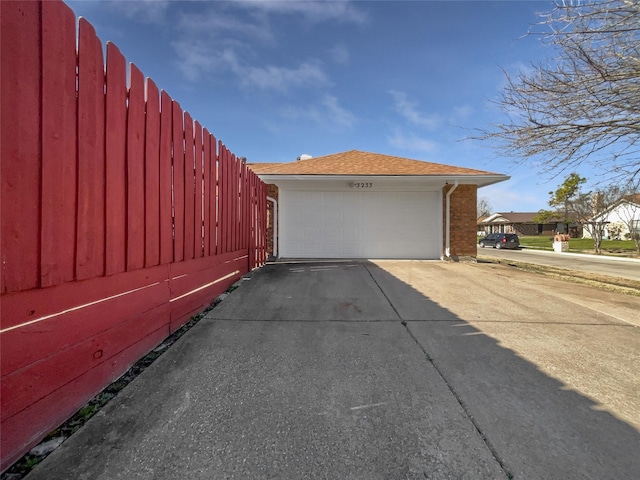 detached garage with fence