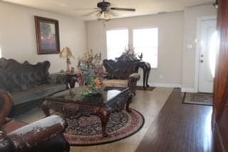 1124 Mazourka Dr, Arlington, TX 76001 - living room with baseboards, a ceiling fan, and wood finished floors