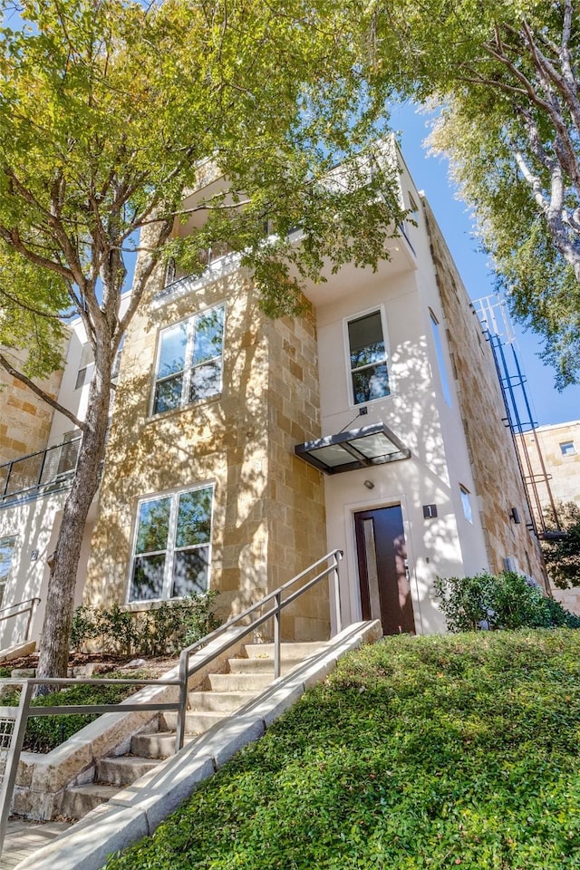 3800 Holland Ave Unit 1, Dallas, TX 75219 - view of front of property featuring stone siding