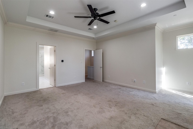 3800 Holland Ave Unit 1, Dallas, TX 75219 - carpeted spare room featuring visible vents, crown molding, ceiling fan, recessed lighting, and a tray ceiling