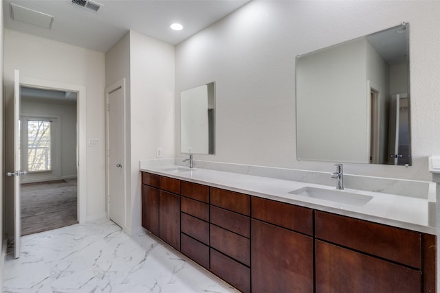 3800 Holland Ave Unit 1, Dallas, TX 75219 - full bath featuring a sink, marble finish floor, double vanity, and visible vents