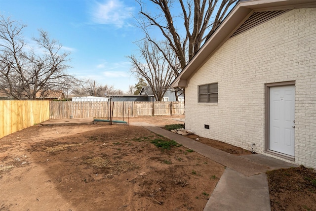 411 N 5th Ave, Munday, TX 76371 - view of yard with a fenced backyard