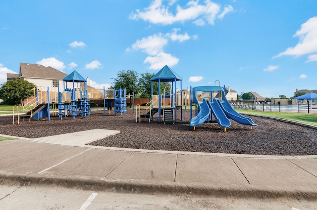 community jungle gym with fence