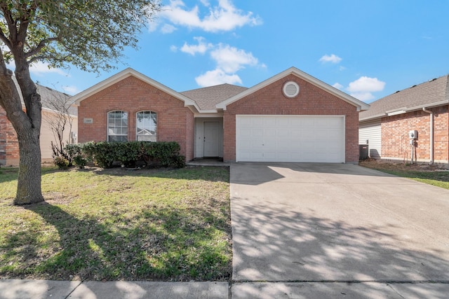 ranch-style home with brick siding, an attached garage, driveway, and a front yard