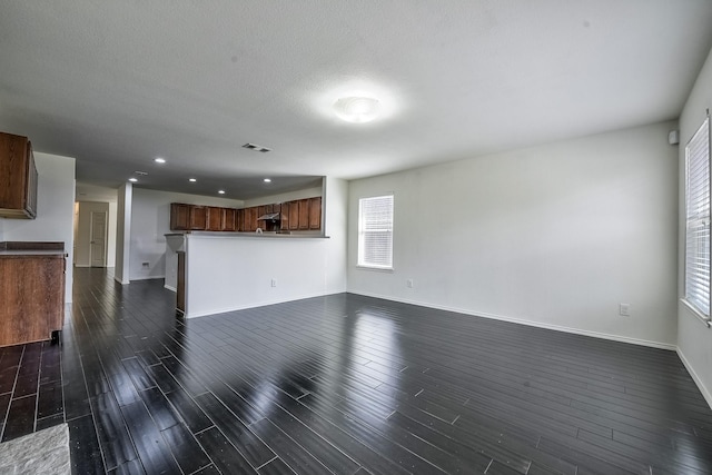 2444 Horseback Trl, Fort Worth, TX 76177 - unfurnished living room with baseboards, recessed lighting, and dark wood finished floors