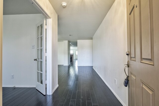 2444 Horseback Trl, Fort Worth, TX 76177 - hall featuring dark wood-style flooring and baseboards