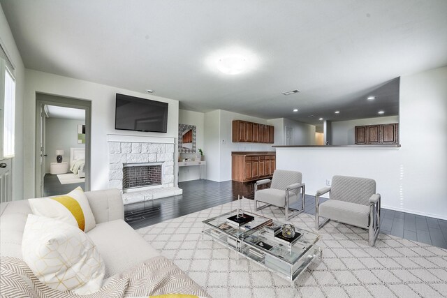 2444 Horseback Trl, Fort Worth, TX 76177 - living room featuring wood finished floors, a stone fireplace, recessed lighting, and baseboards
