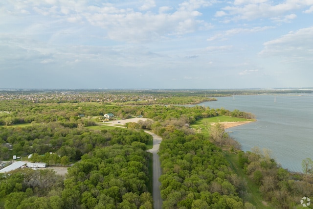 7127 Seagrove Ct, Grand Prairie, TX 75054 - drone / aerial view of a nearby body of water and a heavily wooded area