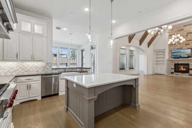 3668 Torrance Blvd, Frisco, TX 75034 - kitchen with built in appliances, recessed lighting, a center island, tasteful backsplash, and gray cabinetry