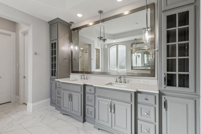 3668 Torrance Blvd, Frisco, TX 75034 - bathroom with double vanity, baseboards, recessed lighting, and a sink