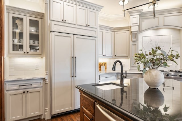 156 Stoneleigh Dr, Heath, TX 75032 - kitchen with paneled built in refrigerator, a sink, tasteful backsplash, and dark stone counters
