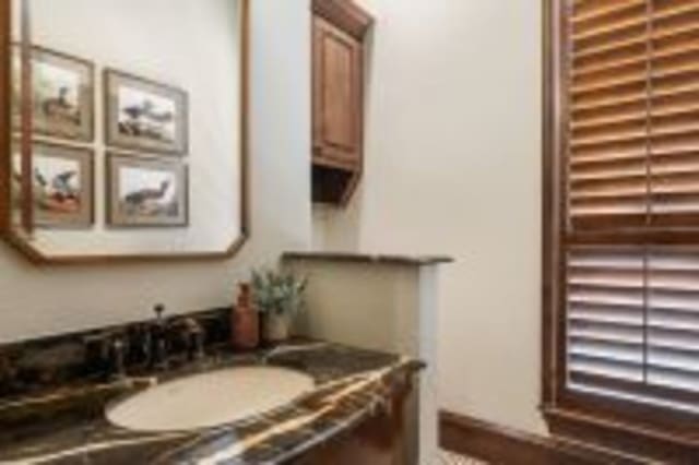 156 Stoneleigh Dr, Heath, TX 75032 - bathroom featuring vanity and radiator heating unit