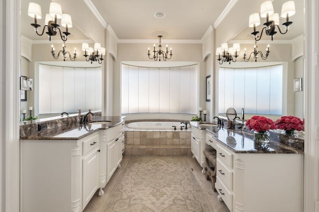 156 Stoneleigh Dr, Heath, TX 75032 - bathroom with a chandelier, vanity, a garden tub, ornamental molding, and tile patterned floors
