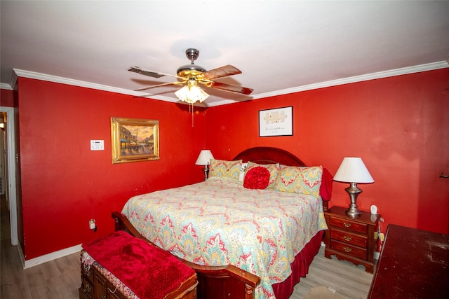 9613 Royalton Dr, Shreveport, LA 71118 - bedroom featuring wood finished floors, visible vents, baseboards, ceiling fan, and crown molding