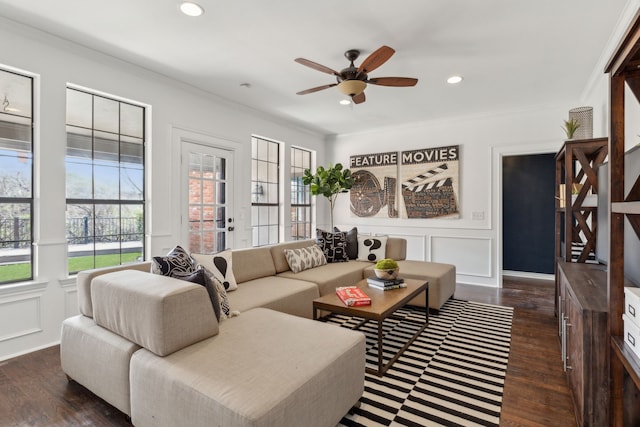 living area featuring dark wood-style floors, a decorative wall, recessed lighting, and ceiling fan