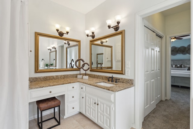 bathroom featuring vanity and ceiling fan