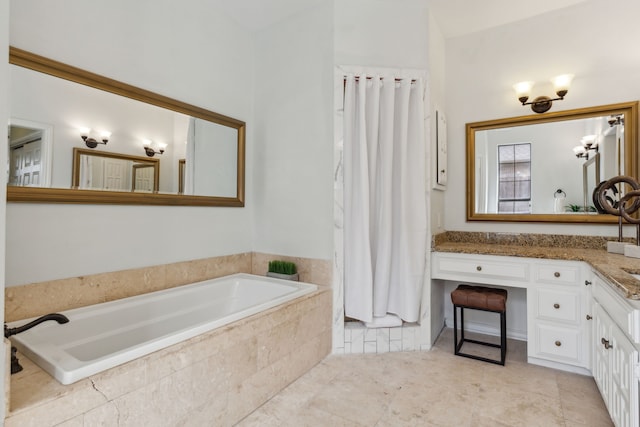 bathroom featuring a bath and vanity