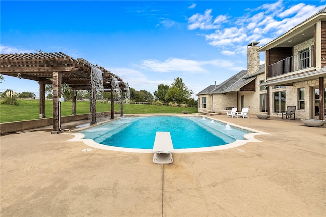 2933 N Star Dr, Celina, TX 75009 - outdoor pool featuring a diving board, a patio area, a pergola, and a lawn