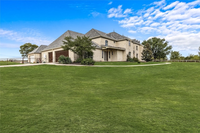 2933 N Star Dr, Celina, TX 75009 - view of front of house featuring an attached garage, concrete driveway, a front yard, and fence