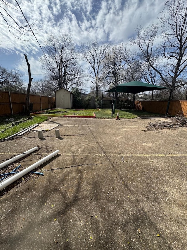 3023 Arizona, Dallas, TX 75216 - exterior space with an outbuilding, a storage unit, and a fenced backyard