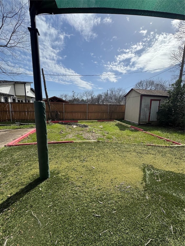 3023 Arizona, Dallas, TX 75216 - view of yard featuring an outbuilding, a storage shed, and a fenced backyard