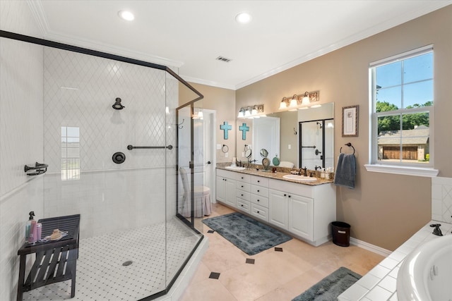 full bathroom with visible vents, a garden tub, ornamental molding, and a shower stall
