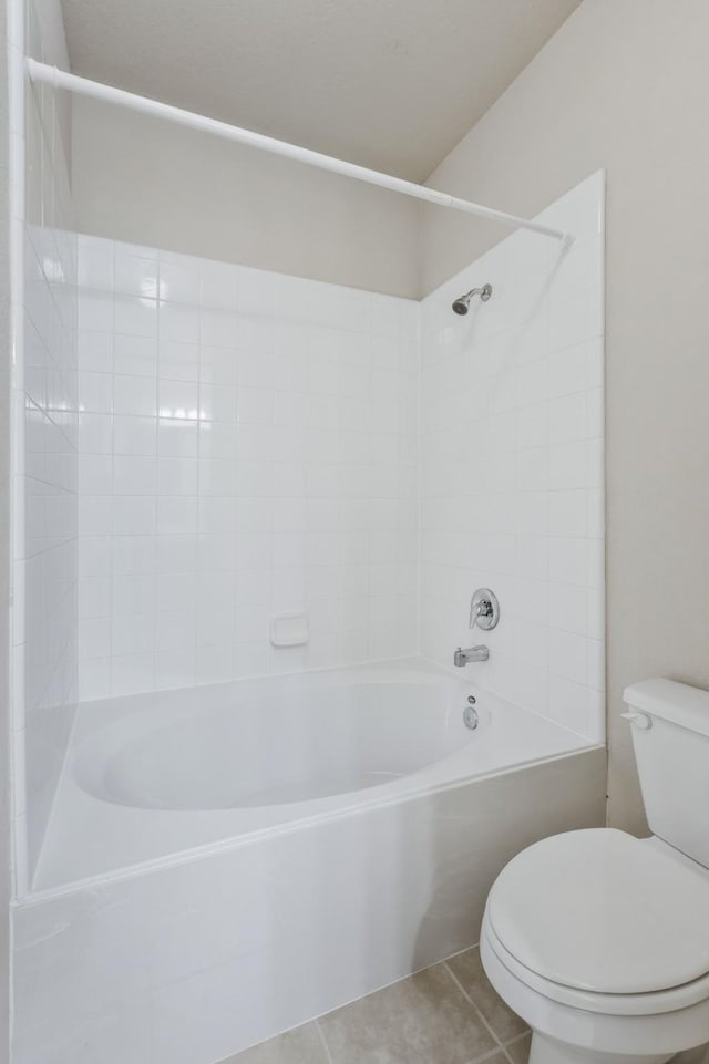 full bath with toilet, shower / bathtub combination, and tile patterned flooring