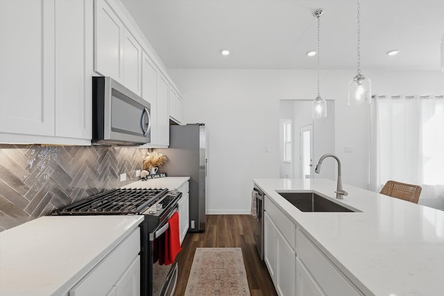 1417 Horizon Way, Northlake, TX 76247 - kitchen featuring a sink, stainless steel appliances, white cabinets, dark wood-type flooring, and tasteful backsplash