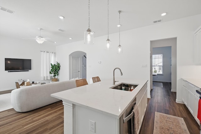 1417 Horizon Way, Northlake, TX 76247 - kitchen with ceiling fan, visible vents, a sink, dark wood-type flooring, and arched walkways