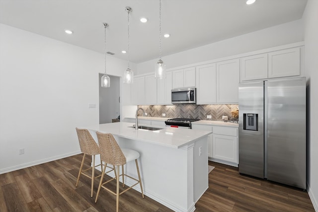 1417 Horizon Way, Northlake, TX 76247 - kitchen featuring a sink, white cabinetry, backsplash, stainless steel appliances, and an island with sink