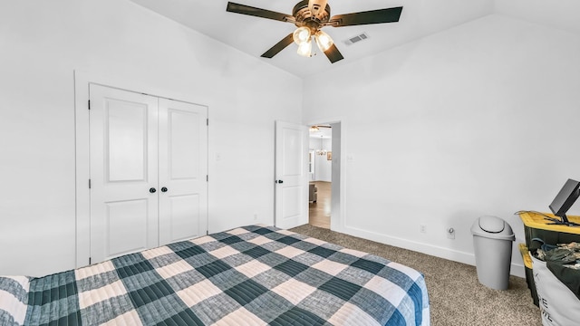 bedroom with carpet flooring, a closet, high vaulted ceiling, a ceiling fan, and visible vents