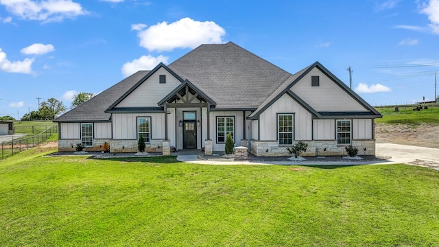 1175 Paradise Pkwy, Poolville, TX 76487 - view of front of house with board and batten siding, a shingled roof, and stone siding
