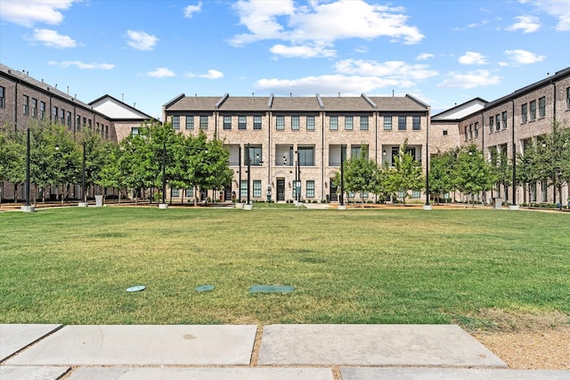 view of community with a yard