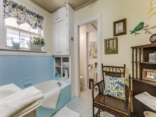 932 Williams St, Rockwall, TX 75087 - bathroom featuring speckled floor and a garden tub