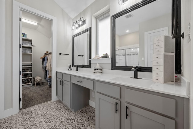 1840 Big Spring Dr, Forney, TX 75126 - full bathroom with double vanity, an enclosed shower, a spacious closet, and vaulted ceiling